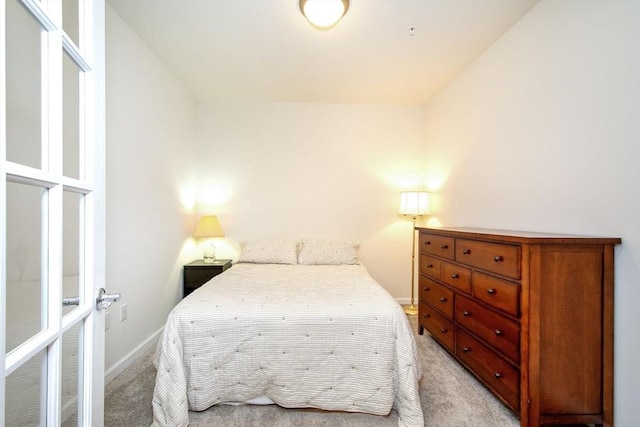 120 University Ave Unit 2202, Westwood, MA 02090 - bedroom featuring light colored carpet and french doors