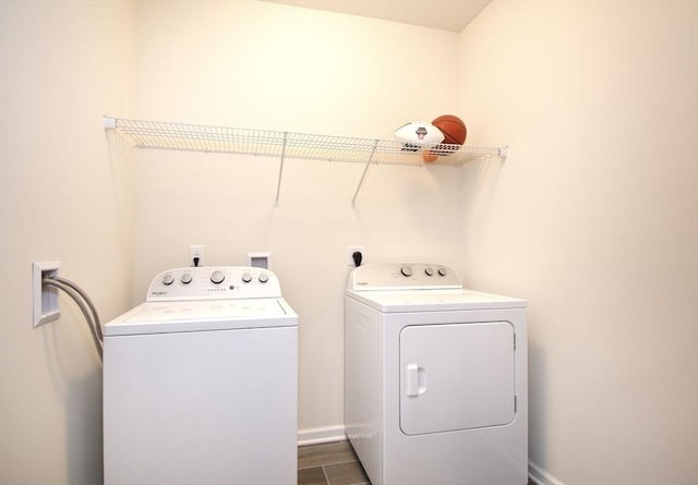 120 University Ave Unit 2202, Westwood, MA 02090 - washroom with washing machine and dryer and baseboards