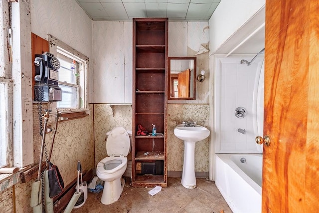 full bathroom with toilet, shower / bath combination, and sink