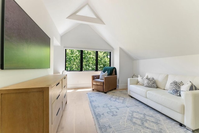 135 Beach St, Cohasset, MA 02025 - living room with vaulted ceiling and light wood finished floors