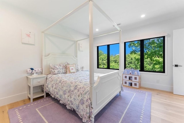 135 Beach St, Cohasset, MA 02025 - bedroom with wood finished floors, baseboards, and recessed lighting