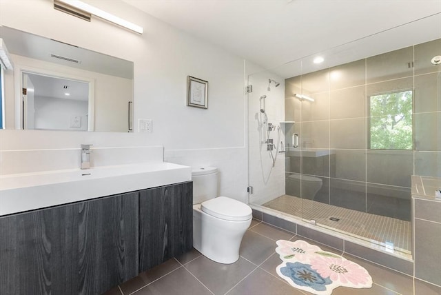 135 Beach St, Cohasset, MA 02025 - bathroom featuring toilet, tile patterned floors, a stall shower, and vanity