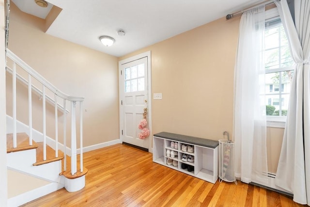 11-13 Turner Ter, Newton, MA 02460 - foyer with stairs and wood finished floors