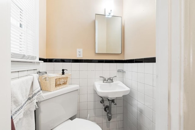 11-13 Turner Ter, Newton, MA 02460 - half bath featuring tile walls and a wainscoted wall