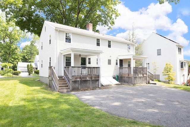 11-13 Turner Ter, Newton, MA 02460 - back of property featuring a chimney, a yard, a wooden deck, and a porch