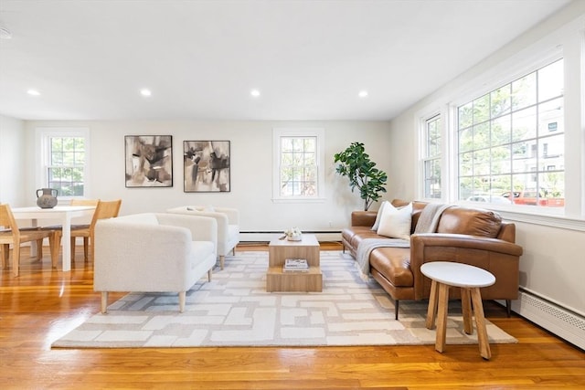 11-13 Turner Ter, Newton, MA 02460 - living room with baseboard heating, light wood-type flooring, and recessed lighting