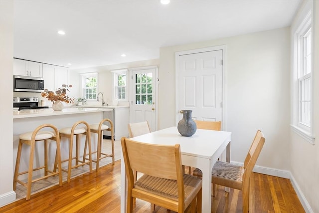 11-13 Turner Ter, Newton, MA 02460 - dining space with light wood finished floors and recessed lighting