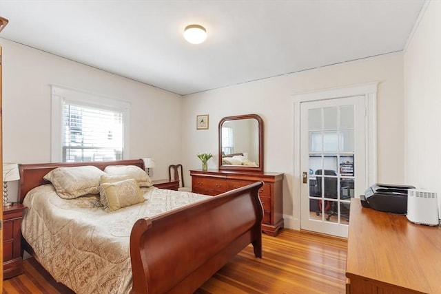 bedroom featuring light wood-style flooring