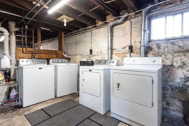 laundry room with laundry area and separate washer and dryer