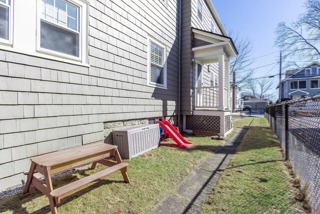 view of property exterior with fence