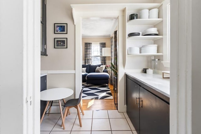 interior space featuring light tile patterned floors