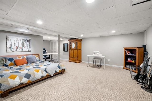 bedroom with recessed lighting, baseboards, and carpet