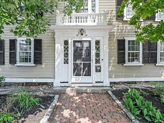 2 Andover St Unit A, Salem, MA 01970 - view of exterior entry with a balcony