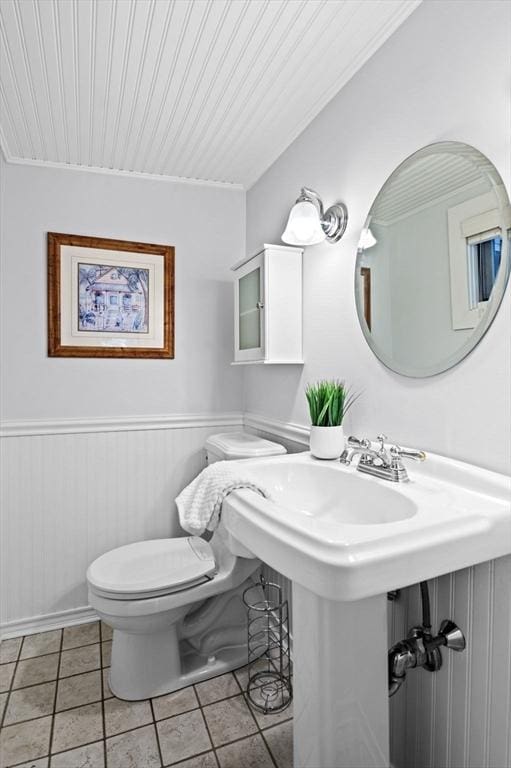 2 Andover St Unit A, Salem, MA 01970 - bathroom featuring a wainscoted wall, tile patterned floors, and wooden ceiling