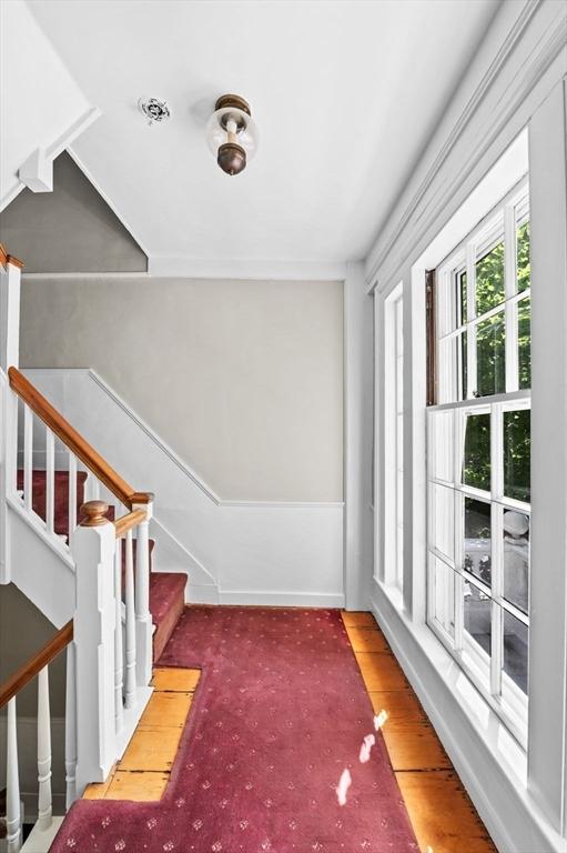 2 Andover St Unit A, Salem, MA 01970 - stairs featuring baseboards