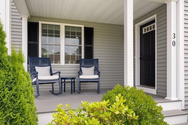 30 Oak Meadow Pl Unit 30, Bridgewater, MA 02324 - doorway to property featuring covered porch