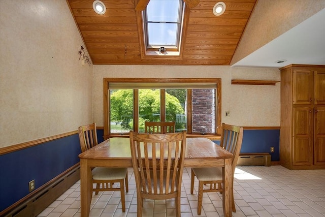 dining room with lofted ceiling, baseboard heating, wooden ceiling, recessed lighting, and a skylight