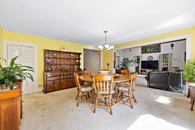 589 Depot St, Harwich, MA 02645 - dining room with a notable chandelier and light carpet