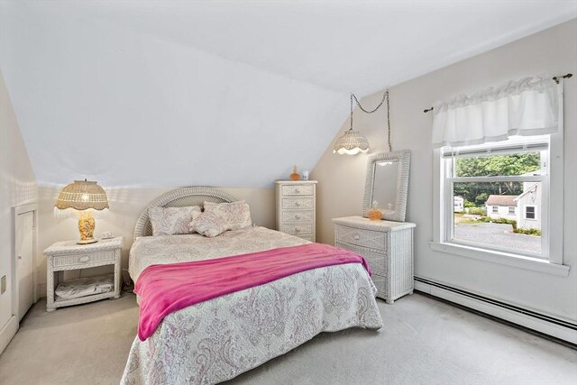 589 Depot St, Harwich, MA 02645 - bedroom featuring vaulted ceiling, baseboard heating, and light carpet