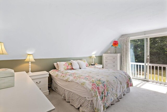 589 Depot St, Harwich, MA 02645 - bedroom featuring vaulted ceiling, access to exterior, and light colored carpet