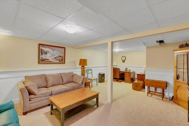 17 Chadwick Ct Unit 17, Mashpee, MA 02649 - living room featuring a drop ceiling, wainscoting, and carpet