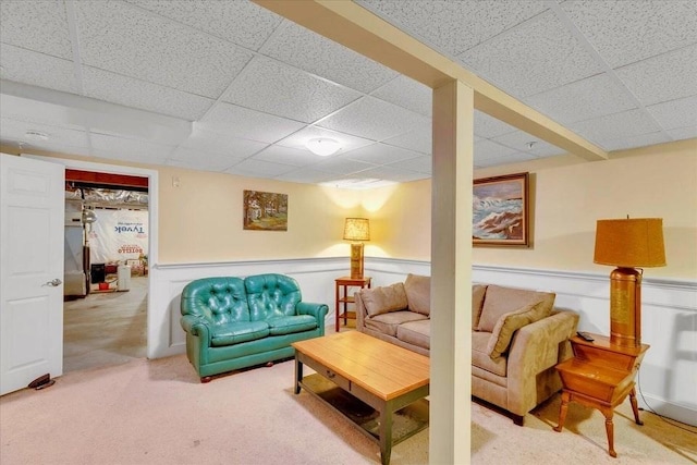17 Chadwick Ct Unit 17, Mashpee, MA 02649 - carpeted living room featuring a paneled ceiling and wainscoting