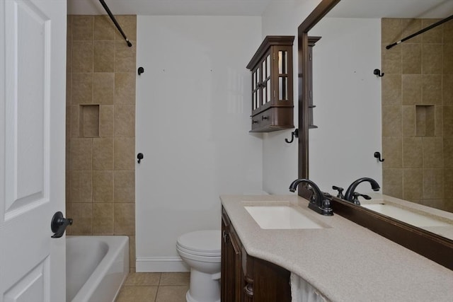 bathroom featuring vanity, shower / bath combination, tile patterned flooring, and toilet