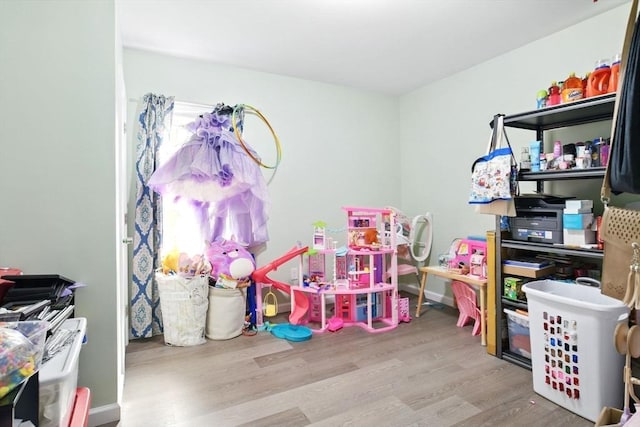80-82 Kenyon St, Springfield, MA 01109 - playroom with wood finished floors