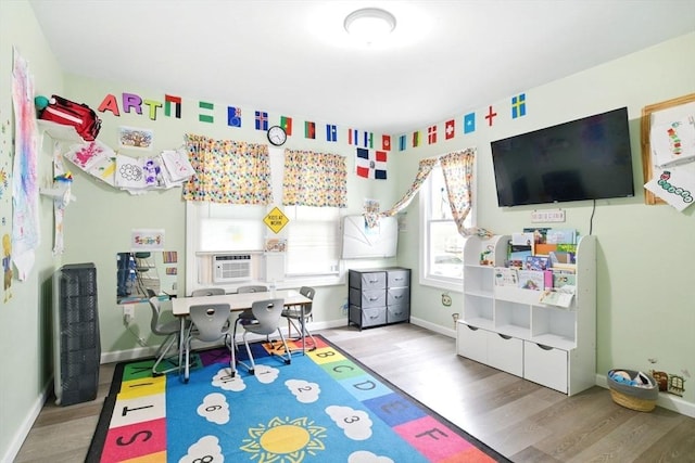 80-82 Kenyon St, Springfield, MA 01109 - rec room featuring wood finished floors, baseboards, and cooling unit