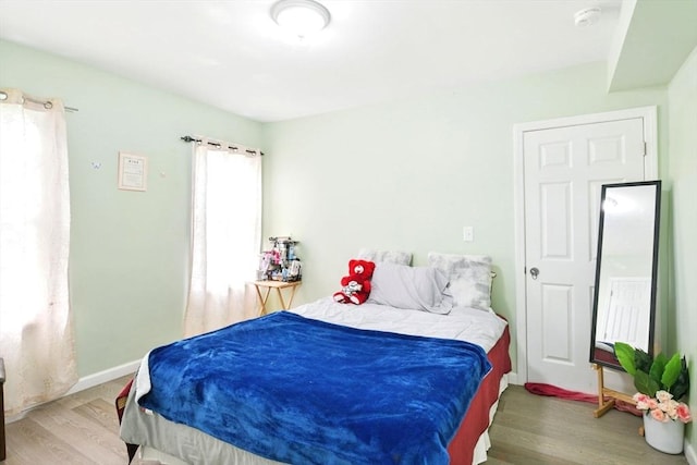 80-82 Kenyon St, Springfield, MA 01109 - bedroom with wood finished floors and baseboards