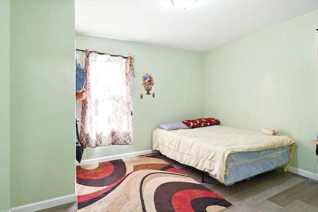80-82 Kenyon St, Springfield, MA 01109 - bedroom with wood finished floors and baseboards