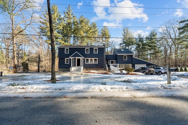 colonial home with a garage