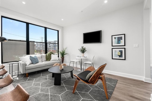 523 2nd St Unit 303, Everett, MA 02149 - living area featuring wood finished floors, baseboards, and recessed lighting