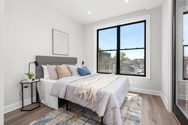 523 2nd St Unit 303, Everett, MA 02149 - bedroom with wood finished floors, baseboards, and recessed lighting