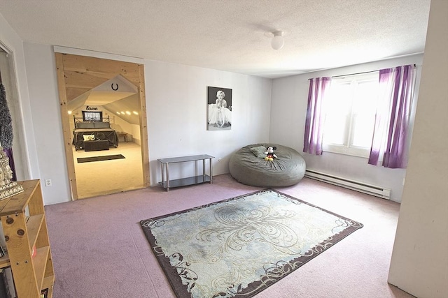 living area with a textured ceiling, a baseboard heating unit, and carpet