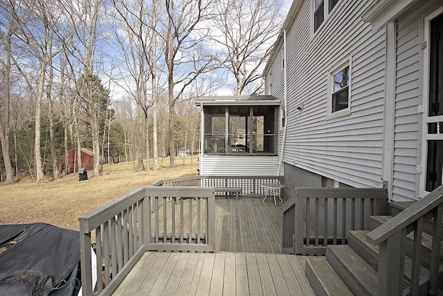 wooden terrace with a sunroom