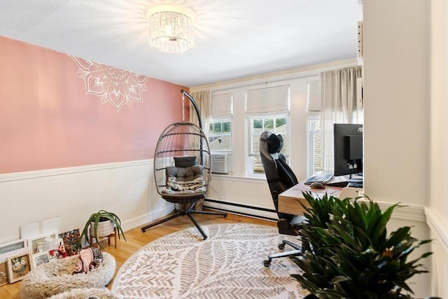 2218 Mystic Valley Pkwy, Medford, MA 02155 - office area featuring a baseboard radiator, a chandelier, wood finished floors, and cooling unit