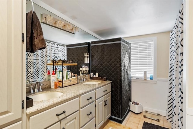 2218 Mystic Valley Pkwy, Medford, MA 02155 - bathroom featuring double vanity, tile patterned flooring, and tiled shower