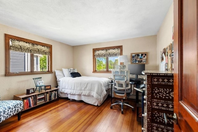 2218 Mystic Valley Pkwy, Medford, MA 02155 - bedroom with hardwood / wood-style floors and an office area