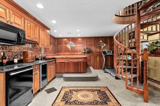 196 Plymouth Ave, Quincy, MA 02169 - kitchen featuring black appliances, dark countertops, a sink, recessed lighting, and brown cabinetry