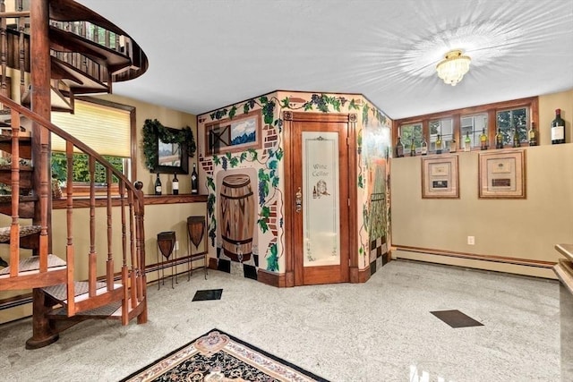 196 Plymouth Ave, Quincy, MA 02169 - interior space with a baseboard radiator, baseboards, and stairs