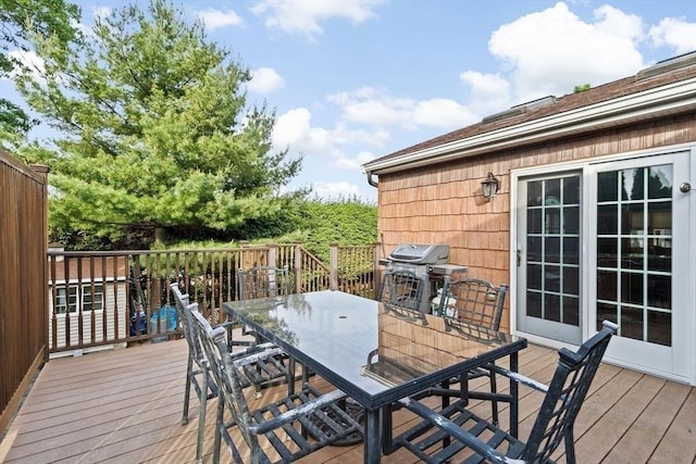 196 Plymouth Ave, Quincy, MA 02169 - wooden deck with outdoor dining space and a grill