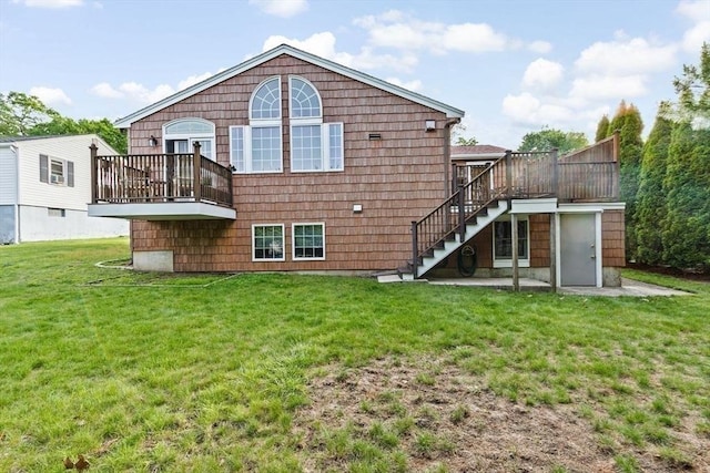 196 Plymouth Ave, Quincy, MA 02169 - rear view of property with stairway, a wooden deck, and a lawn