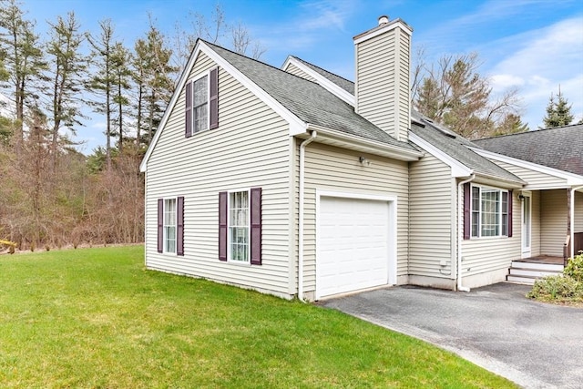 view of side of property featuring a yard