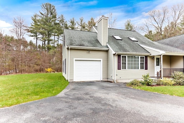 view of side of home with a garage and a yard