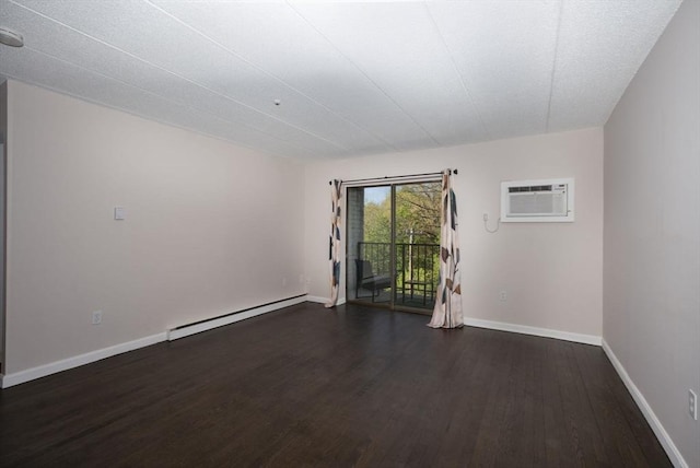 unfurnished room with baseboards, a baseboard radiator, dark wood finished floors, and a wall mounted AC