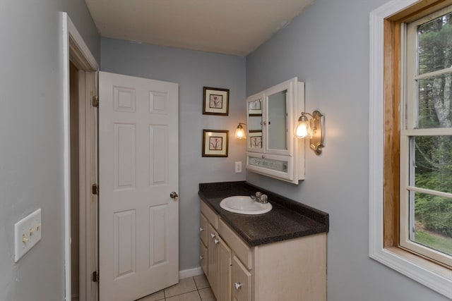 bathroom with vanity and tile patterned floors