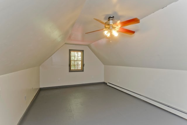 bonus room featuring ceiling fan, baseboard heating, and vaulted ceiling