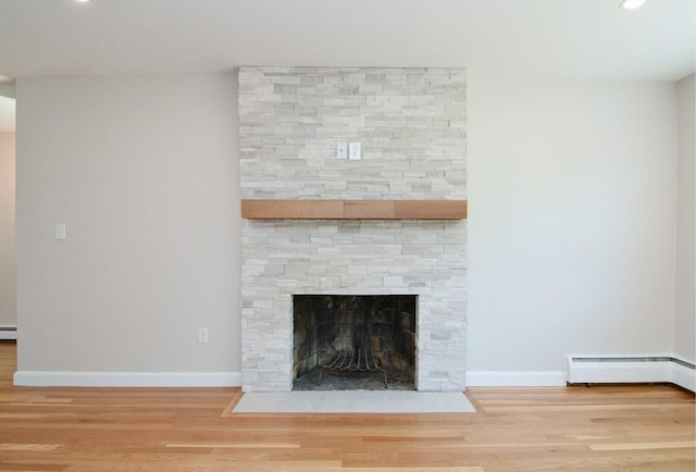 19 Woodcliff Rd, Holbrook, MA 02343 - unfurnished living room featuring wood finished floors, baseboards, recessed lighting, and a stone fireplace