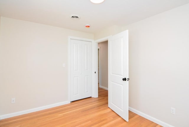 19 Woodcliff Rd, Holbrook, MA 02343 - empty room with baseboards and light wood-type flooring